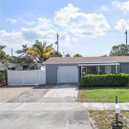 Buy this 4 bed house on 2510 Ne 9th Ave in Pompano Beach, Florida