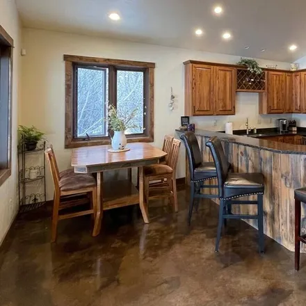 Rent this 3 bed house on Wolf Creek in MT, 59648