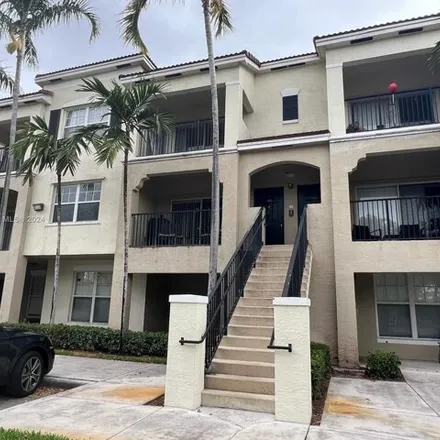 Rent this 2 bed condo on Garrett Academy in West Sample Road, Coral Springs