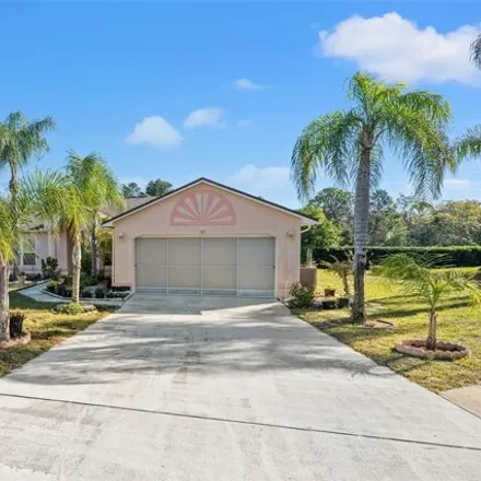 Buy this 4 bed house on 1397 Masada Lane in Spring Hill, FL 34608