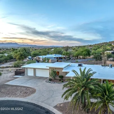 Buy this 4 bed house on 401 East Windy Peak Circle in Oro Valley, AZ 85704