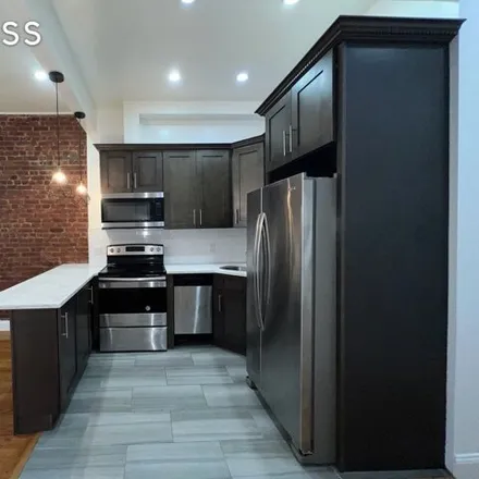 Rent this 4 bed house on 54 Patchen Avenue in New York, NY 11221