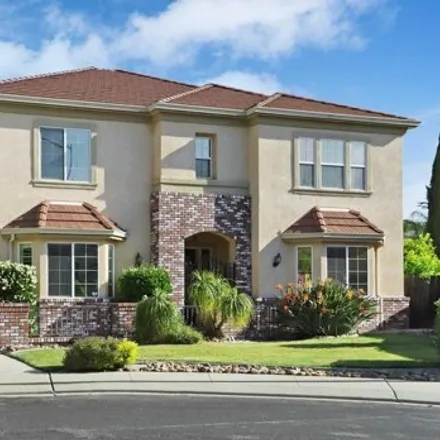 Buy this 5 bed house on 1099 Sweet Pea Place in Manteca, CA 95336