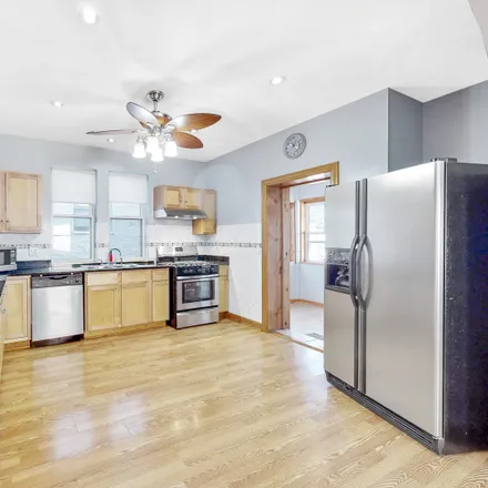Image 4 - 6028 North Rockwell Street, Chicago, IL 60645, USA - House for sale
