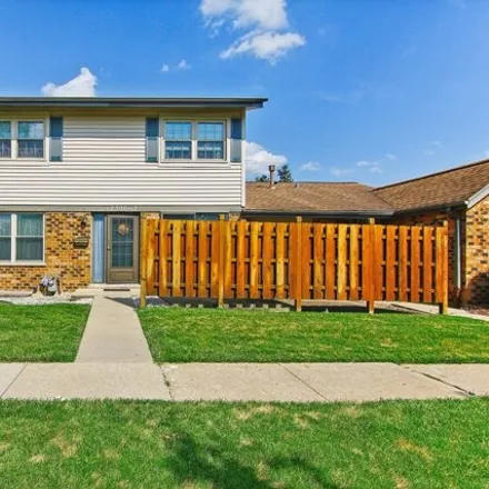 Buy this 2 bed house on 7300 Winthrop Way Unit 2 in Downers Grove, Illinois