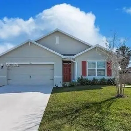 Rent this 4 bed house on 1783 Southwest Cinema Street in Port Saint Lucie, FL 34953
