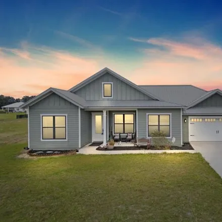 Buy this 4 bed house on SW 84 LANE in Gilchrist County, FL
