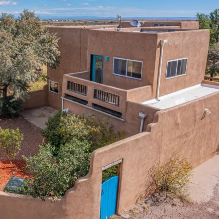 Buy this 3 bed house on 2 Tierra del Sol Drive in Santa Fe County, NM 87015
