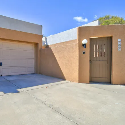 Buy this 2 bed townhouse on San Blas Place Northwest in Albuquerque, NM 87120