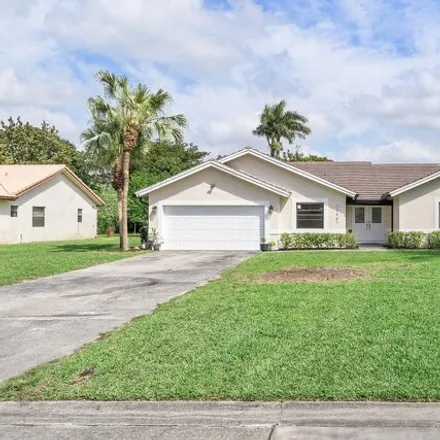 Rent this 4 bed house on 11467 Northwest 39th Street in Coral Springs, FL 33065