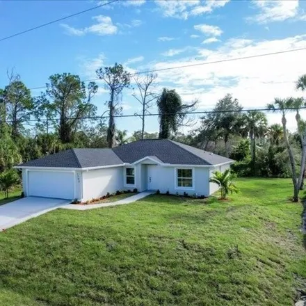 Buy this 4 bed house on 3854 21st Street Southwest in Lehigh Acres, FL 33976