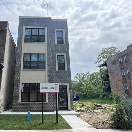 Rent this 3 bed apartment on 5819 S Michigan Ave Unit 2 in Chicago, Illinois