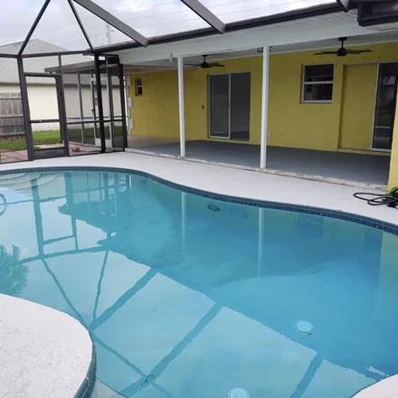 Rent this 3 bed house on 297 Southwest Glenwood Drive in Port Saint Lucie, FL 34984