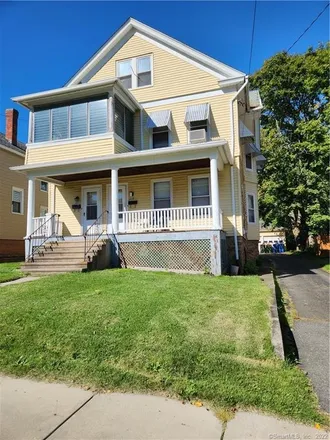 Buy this 4 bed townhouse on 215 Elm Street in Meriden, CT 06450