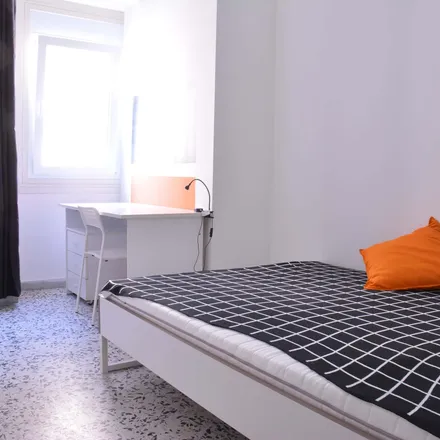 Rent this 6 bed room on Via dei Giudicati 3 in 09131 Cagliari Casteddu/Cagliari, Italy