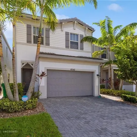 Rent this 3 bed house on NW 48th Terrace in Tamarac, FL 33319