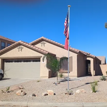 Rent this 3 bed house on 906 East Desert Rose Trail