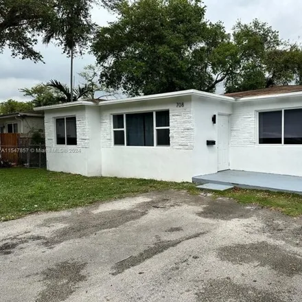 Rent this 3 bed house on 722 Southwest 6th Street in Ro-Len Lake Gardens, Hallandale Beach