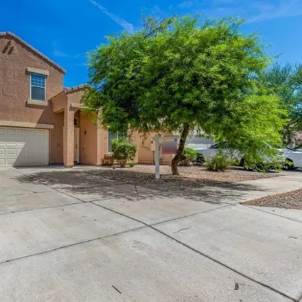 Rent this 4 bed house on 3318 West Hidalgo Avenue in Phoenix, AZ 85399