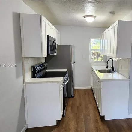 Rent this 1 bed apartment on 2864 Northwest 6th Court