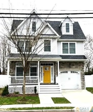 Buy this 5 bed house on 115 Durham Avenue in Metuchen, NJ 08840
