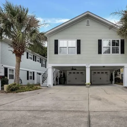 Buy this 3 bed house on Quality Inn Surfside Myrtle Beach in 1201 Camellia Drive, Surfside Beach