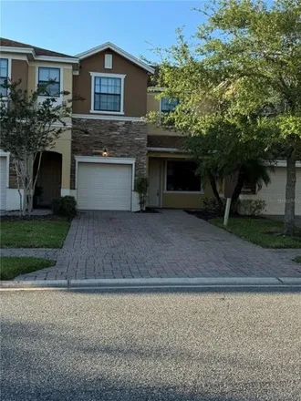 Rent this 3 bed house on 1635 Portofino Meadows Boulevard in Meadow Woods, Orange County