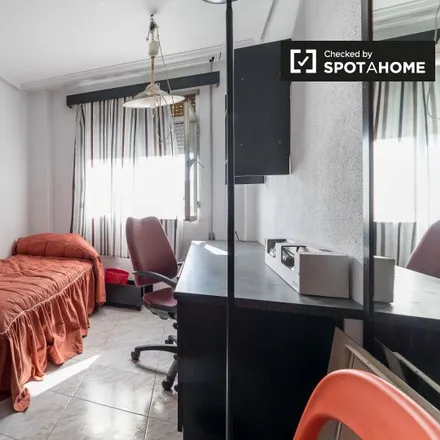 Rent this 4 bed room on Plaça de Sant Felip Neri in 5, 46021 Valencia