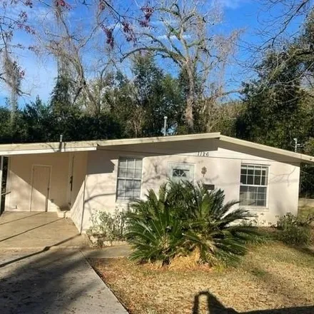 Rent this 3 bed house on 1126 North Martin Luther King Junior Boulevard in Tallahassee, FL 32303