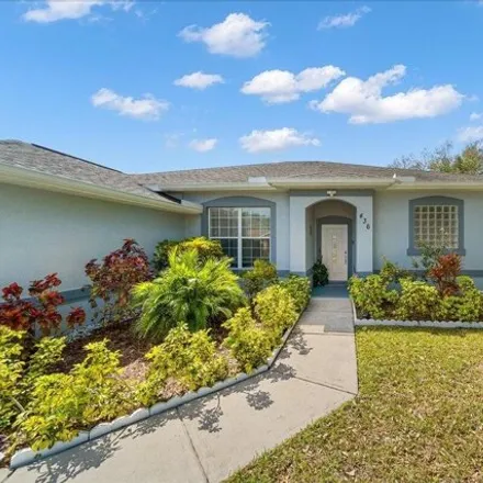 Buy this 3 bed house on 428 Americana Boulevard Northwest in Palm Bay, FL 32907