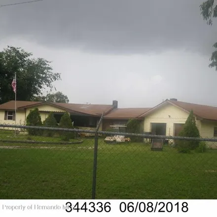Buy this 4 bed house on 15296 Ganster Dr in Spring Hill, Florida