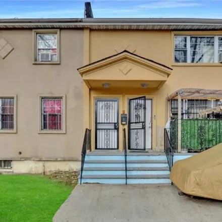 Buy this 7 bed house on 108-14 167th Street in New York, NY 11433