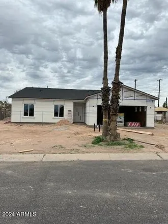 Buy this 4 bed house on 2704 West Cholla Street in Apache Junction, AZ 85120