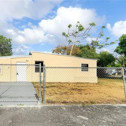 Buy this 4 bed house on 1612 Northwest 16th Way in Fort Lauderdale, FL 33311