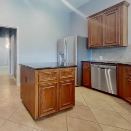 Rent this 4 bed apartment on 13606 Orchard Wind Lane in West Haven, Pearland