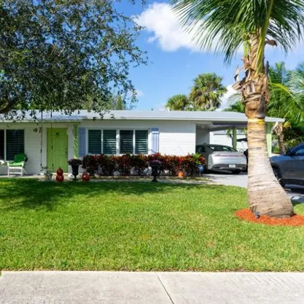 Buy this 3 bed house on 1690 Northeast Orion Street in Jensen Beach, FL 34957