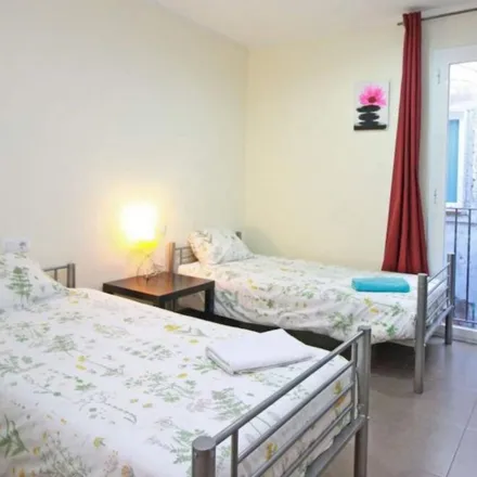 Rent this 6 bed room on Carrer de l'Hospital in 8, 08001 Barcelona