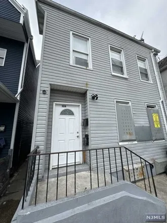 Buy this 7 bed house on 108 Madison Street in Paterson, NJ 07501
