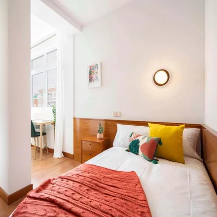 Rent this 12 bed room on Love Home in Calle de Fulgencio de Miguel, 29039 Madrid