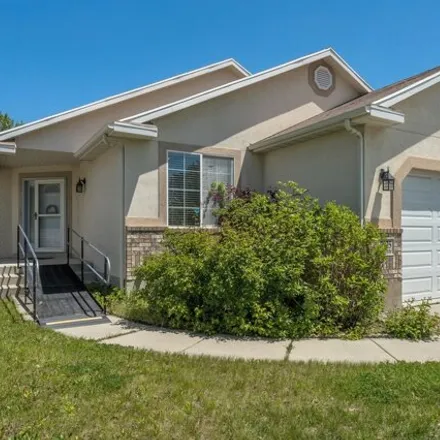 Buy this 5 bed house on 5927 Stone Flower Way in Kearns, UT 84118