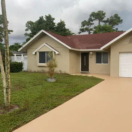 Rent this 3 bed house on 5129 Van Buren Road in County Club Acres, Palm Beach County