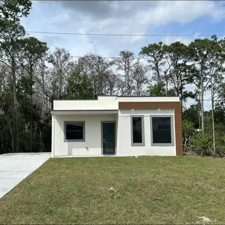 Buy this 2 bed house on 999 Alcade Street in Lehigh Acres, FL 33974