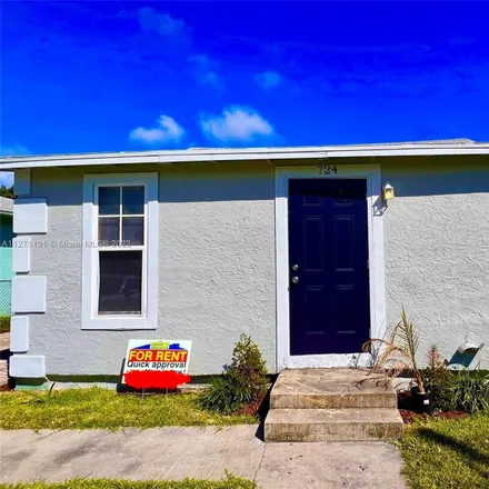 Rent this 2 bed house on 724 West 7th Street in Riviera Beach, FL 33404