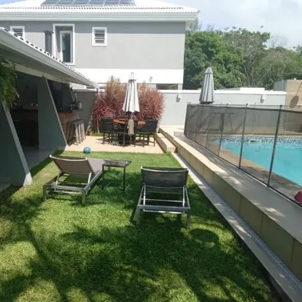 Rent this 5 bed house on Rua Pio Borges de Castro 364 in Barra da Tijuca, Rio de Janeiro - RJ