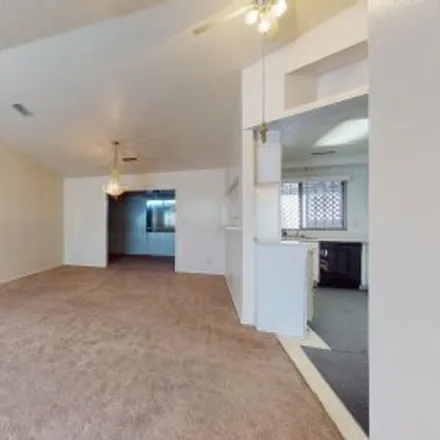 Rent this 3 bed apartment on 8709 Sun Avenue Southwest in Westgate Heights, Albuquerque