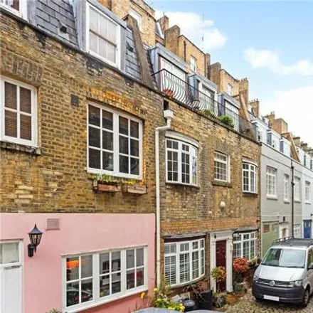 Buy this 2 bed townhouse on St George's Square Mews in London, SW1V 3RZ