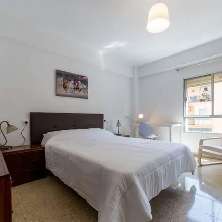 Rent this 6 bed apartment on Carrer de Rubén Vela in 46006 Valencia, Spain