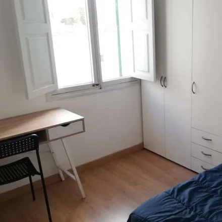 Rent this 4 bed room on Palma Fit in Carrer de Ticià, 36