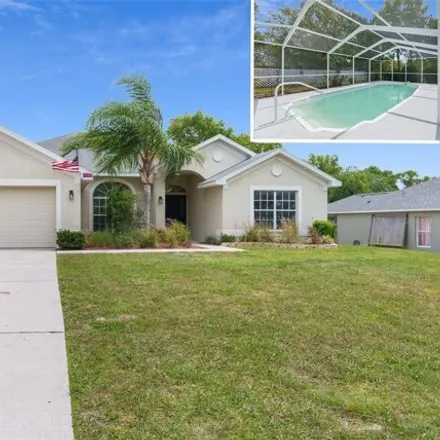 Buy this 5 bed house on 2498 Magellan Avenue in Spring Hill, FL 34608