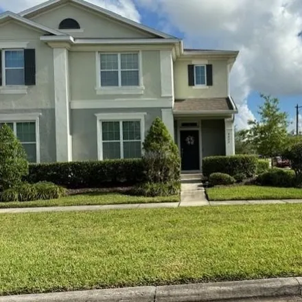 Buy this 4 bed house on 1890 Centennial Avenue in Saint Cloud, FL 34769